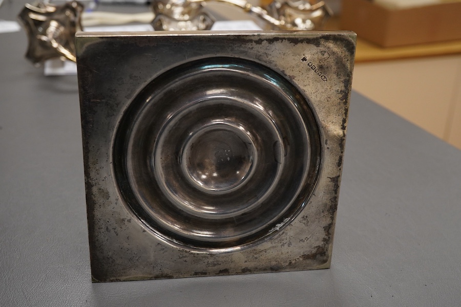 A garniture of 19th century silver plated Corinthian column candelabra, comprising a pair of two branch, three light candelabra and matching four branch, five light candelabrum, with detachable acanthus leaf capped scrol